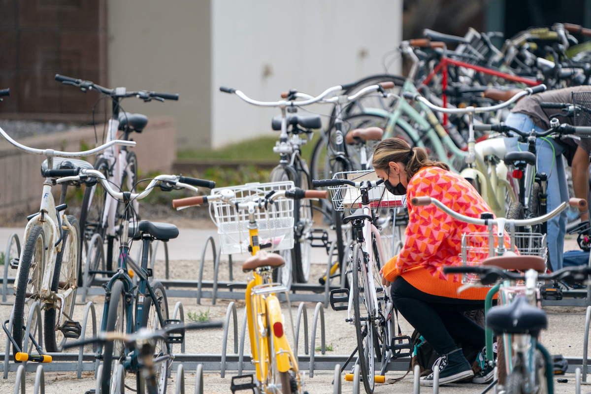 student locking bike